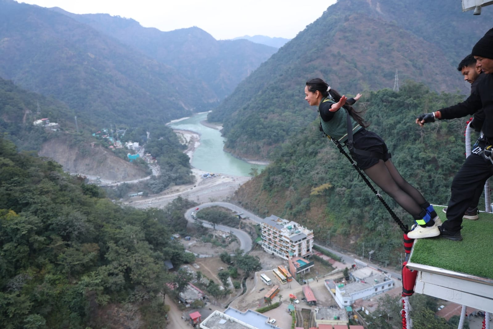 Bungee jumping above the river valley